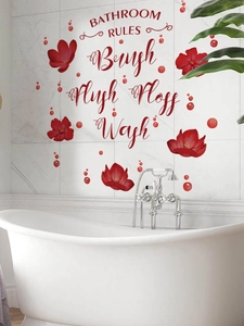 Detail of red floral bathroom rules wall decal with brush flush floss wash instructions