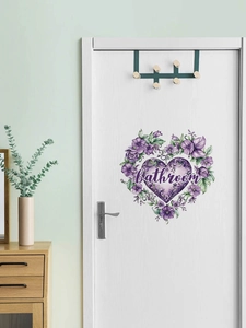 Purple floral heart bathroom wall sticker decoration on a white wooden door in a room