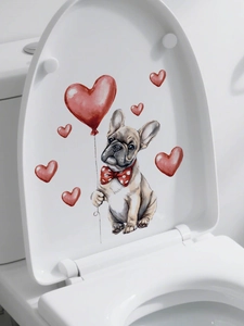 Detail of French Bulldog and red heart balloon sticker applied on white toilet lid surface