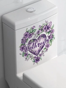 Detailed view of purple rose heart wreath sticker with Bathroom text on a ceramic tank