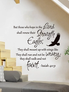 Macro detail of Bible verse eagle wall sticker on living room wall beside the stairs