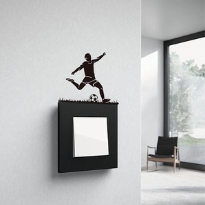 Soccer player silhouette wall sticker for home decor with grassy detail and sports theme