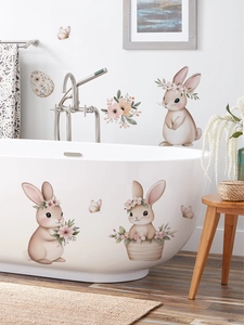 Detalle de pegatinas de pared de conejo de Pascua rosa con motivos de flores y mariposas