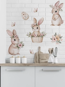 Detalle de vinilos de conejos de Pascua en estilo acuarela sobre pared con textura