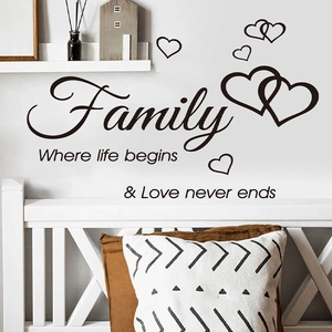 Family quote wall sticker for home decor with heart accents on bedroom wall