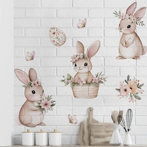 Pegatinas de pared de conejo de Pascua rosa con coronas de flores y huevos decorativos