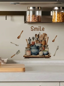 Detail of waterproof PVC kitchen wall decals featuring smile text and seasoning jars