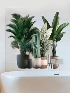 Detail of tropical green plant wall decals featuring potted palms on white tiles