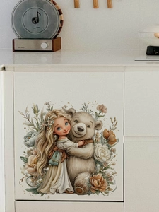 Detailed view of girl hugging bear PVC wall sticker on creamy white cabinet door