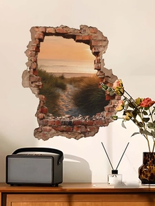 Detailed 3D wall sticker featuring a broken wall effect with a sunset beach landscape