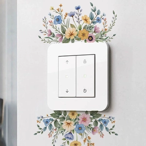 Floral wall stickers decorating a white dual-button smart light switch panel for home