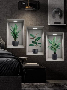 Close-up of three wireless LED puck lights installed in a modern recessed wall niche