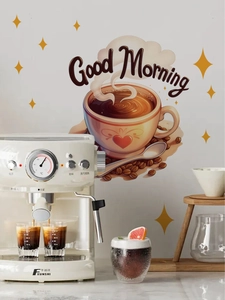 Detail of coffee cup and stars wall sticker applied on a kitchen wall with warm tones