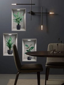 Detail of 3D green plant wall stickers featuring potted foliage for living room decor