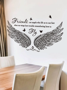 Detail of elegant black wing wall decals with inspirational quote and butterflies