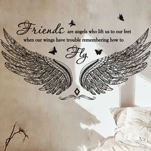 Elegant black vinyl wall decal with angel wings, butterflies and friendship quote for bedroom