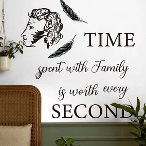 Family Time wall sticker with classic silhouette and feathers on a white bedroom wall