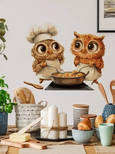 Detailed view of kitchen wall stickers featuring cartoon owl chefs on a dining room wall