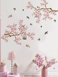 Detailed wall sticker view of pink cherry blossoms, birds and butterflies in a home setting