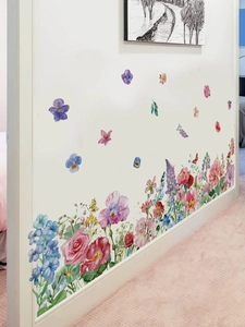 Detailed watercolor wall sticker featuring wild flowers and butterflies on a white wall