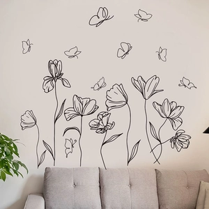 Minimalist black floral and butterfly line art wall stickers for modern living room decor