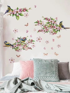 Detail of peach blossom branch wall stickers with birds and butterflies for bedroom decor