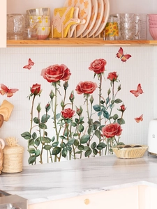 Detailed watercolor red roses and butterflies wall decal applied on white kitchen tiles