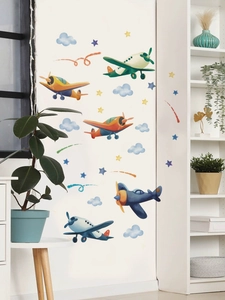 Detail of cartoon airplanes and blue clouds PVC wall stickers for a boy bedroom decor