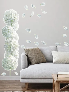 Detailed white hydrangea wall sticker set on grey wall background with modern sofa