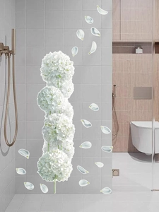 Detail view of white hydrangea wall stickers applied on modern bathroom glass door surfaces