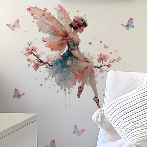 Floral fairy wall sticker with pink petal wings sitting on a branch for bedroom decor