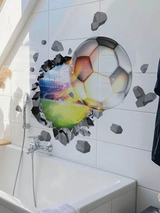 Sticker mural 3D football montrant un stade réaliste à travers les carreaux blancs de mur