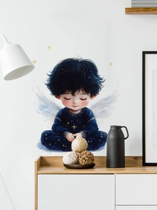 Detail of sleeping angel boy wall sticker in navy blue stars outfit with white wings