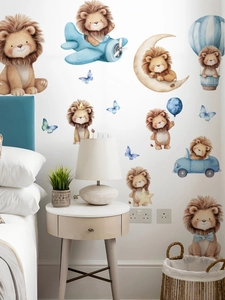 Detail of hand-painted lion wall decals for nursery with blue airplanes and balloons