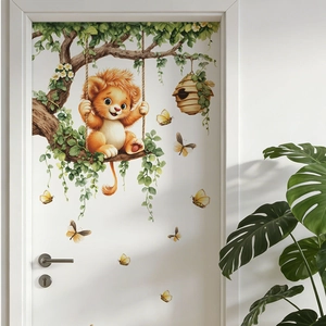 Cartoon lion swinging on a branch wall sticker for bedroom and nursery home decoration