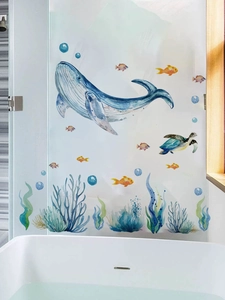 Detailed view of watercolor ocean animal wall stickers applied to bathroom glass partition