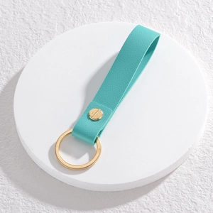 Minimalist DIY leather keychain in tiffany blue with high-quality gold hardware and screw bolt