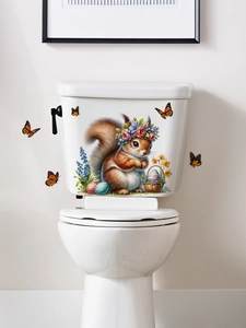 Detalle de pegatinas de PVC de ardilla de Pascua y mariposas en cisterna de WC