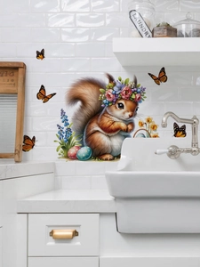 Detalle de vinilo decorativo de ardilla de Pascua con mariposas en pared de azulejos blancos