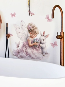 Detail of fairy girl wall sticker with rabbit and easter eggs on a white bathroom wall