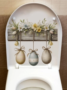 Detail view of Easter floral and eggs PVC decal applied on a white bathroom toilet lid