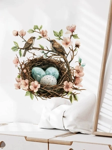 Detail of Easter wall sticker featuring watercolor birds, bird nest and pink cherry blossoms