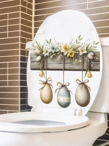 Detail of Easter floral stickers with patterned eggs on a white toilet lid cover