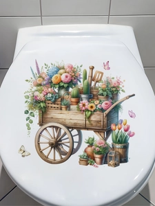 Detail of floral cart PVC sticker applied on a white toilet lid for bathroom decoration