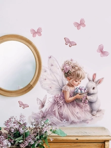 Detail of Easter fairy girl and bunny wall decal applied on bedroom white wall