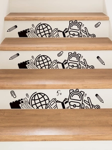 Close-up of black line school stationery wall stickers on wooden stair risers
