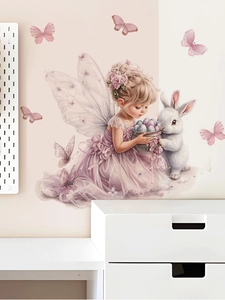 Detail of fairy wall sticker featuring a lavender girl and bunny for nursery decoration