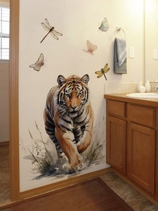 Close-up of watercolor tiger wall sticker with butterflies in a warm bathroom setting