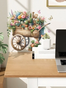 Detail view of Easter floral cart wall decal on light wall above a cozy wooden desk setup