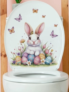 Close-up of Easter rabbit and colorful eggs PVC self-adhesive sticker on white toilet lid